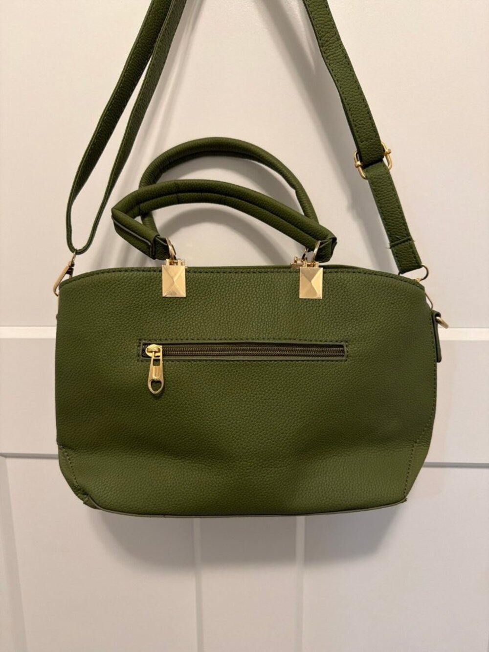 Danbaoly crossbody handbag with gold accents and a bow charm. - Picture 4 of 5